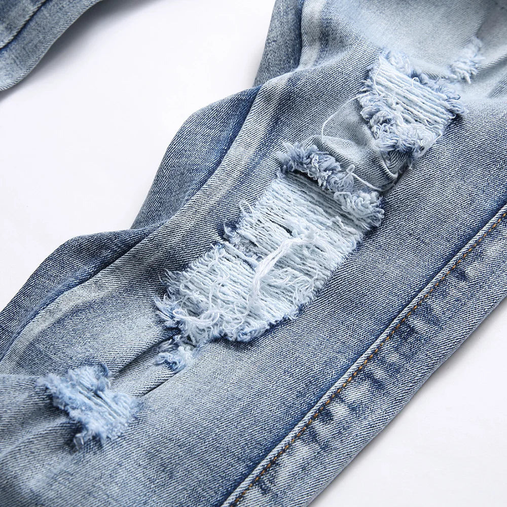 Snake Embroidered Ripped Denim Jeans