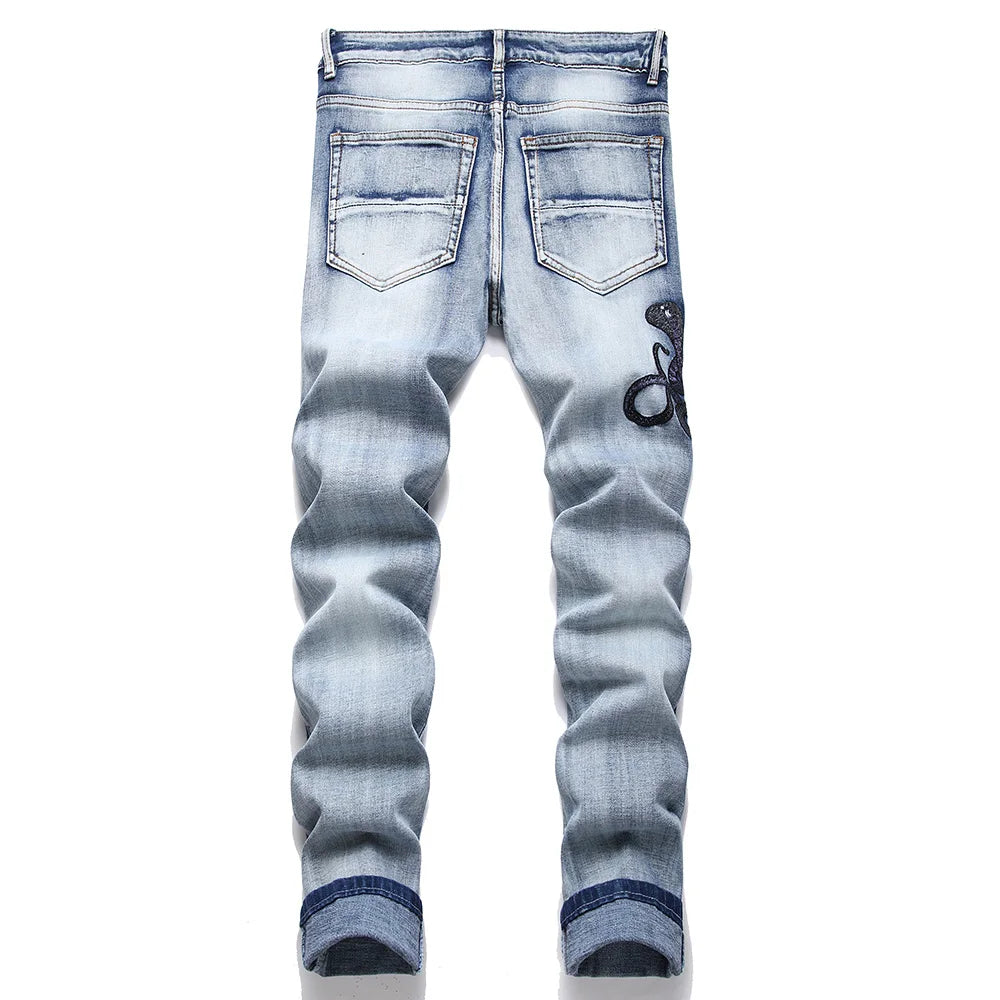 Snake Embroidered Ripped Denim Jeans