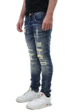 RIPPED MID-RISE SKINNY JEANS