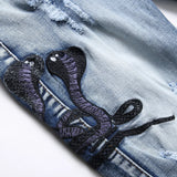 Snake Embroidered Ripped Denim Jeans