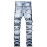 Snake Embroidered Ripped Denim Jeans