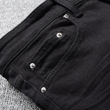 black distressed ripped denim jeans